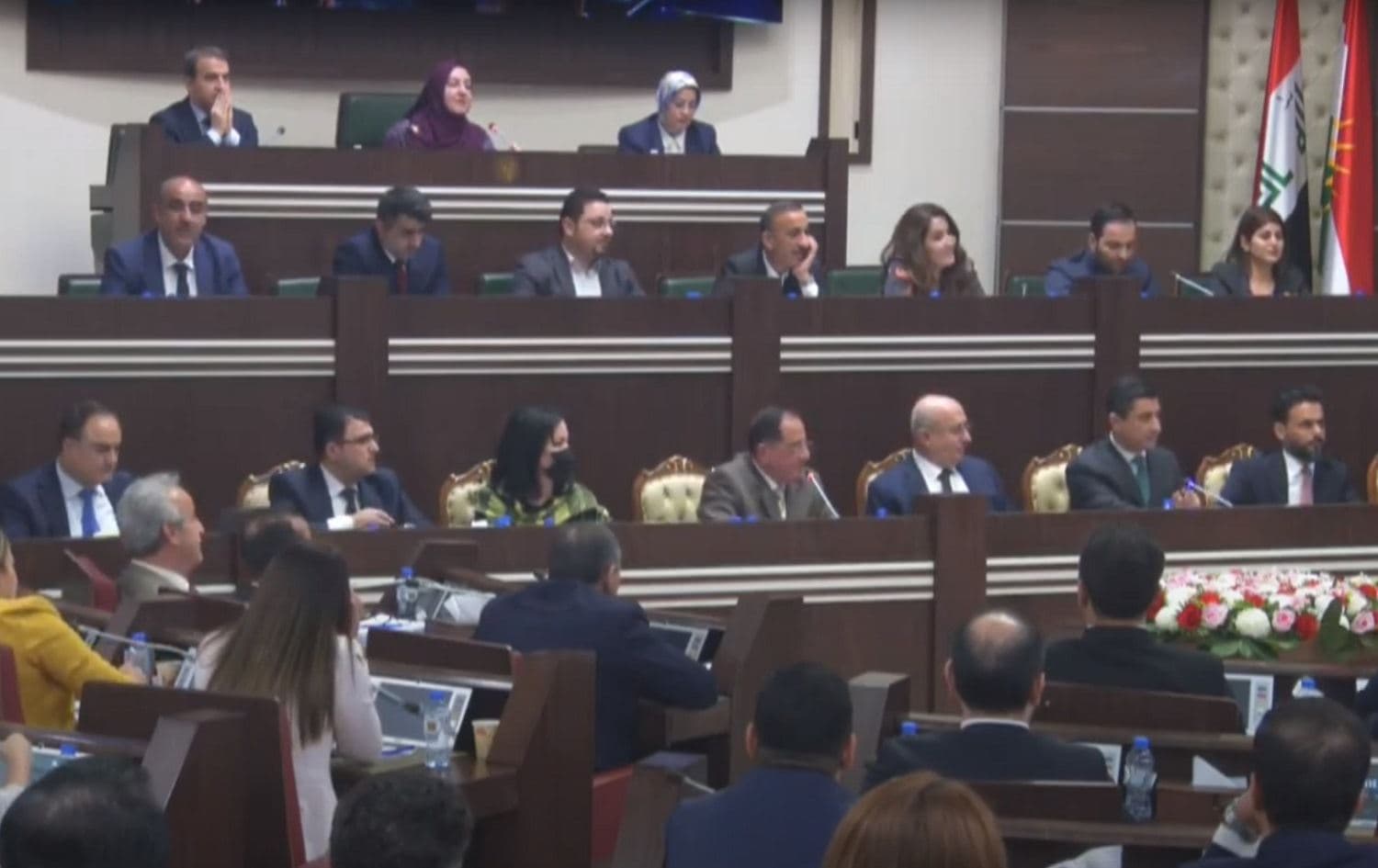 Minister of Finance Awat Sheikh Janab (3rd from right) and Minister of State Khalid Shwani (2nd from right) attend a parliamentary session in Erbil on June 28, 2021. Photo: screengrab/Kurdistan parliament