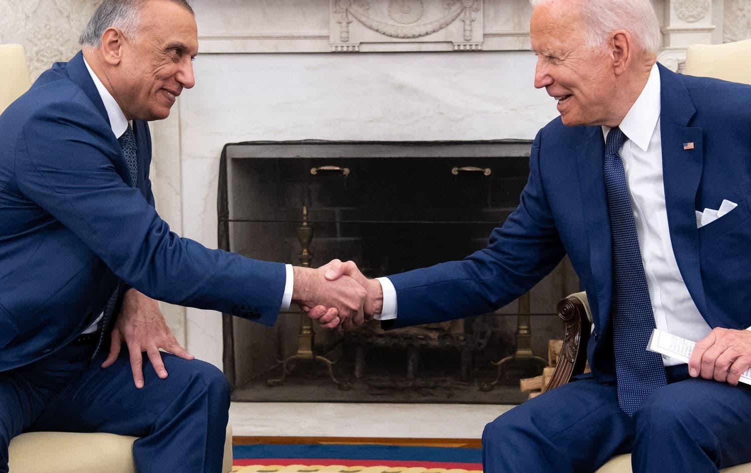 Iraq Prime Minister Mustafa al-Kadhimi (left) and US President Joe Biden shake hands in the Oval Office of the White House on July 26, 2021. Photo: Saul Loeb/AFP