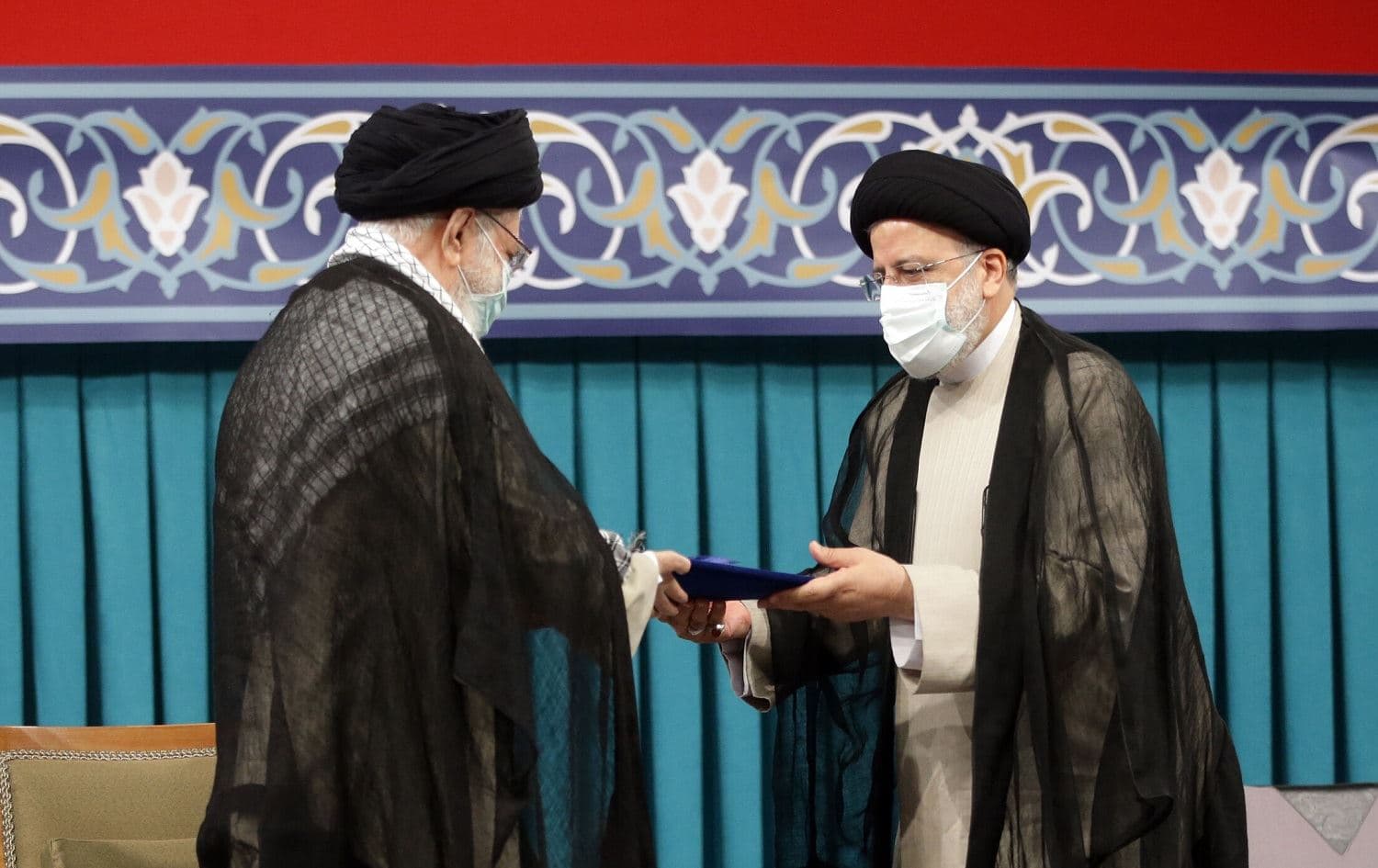 Ayatollah Ali Khamenei (left) endorsed the presidency of Ebrahim Raisi (right) in a ceremony in Tehran on August 3, 2021. Photo: handout/Iran presidency
