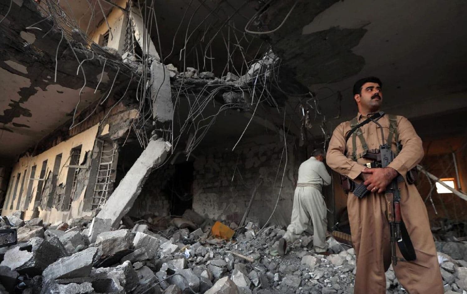 Peshmerga from the Iranian Kurdistan Democratic Party check the damage after a rocket attack on their headquarters in Koya, Kurdistan Region on September 8, 2018. File photo: Safin Hamed/AFP 