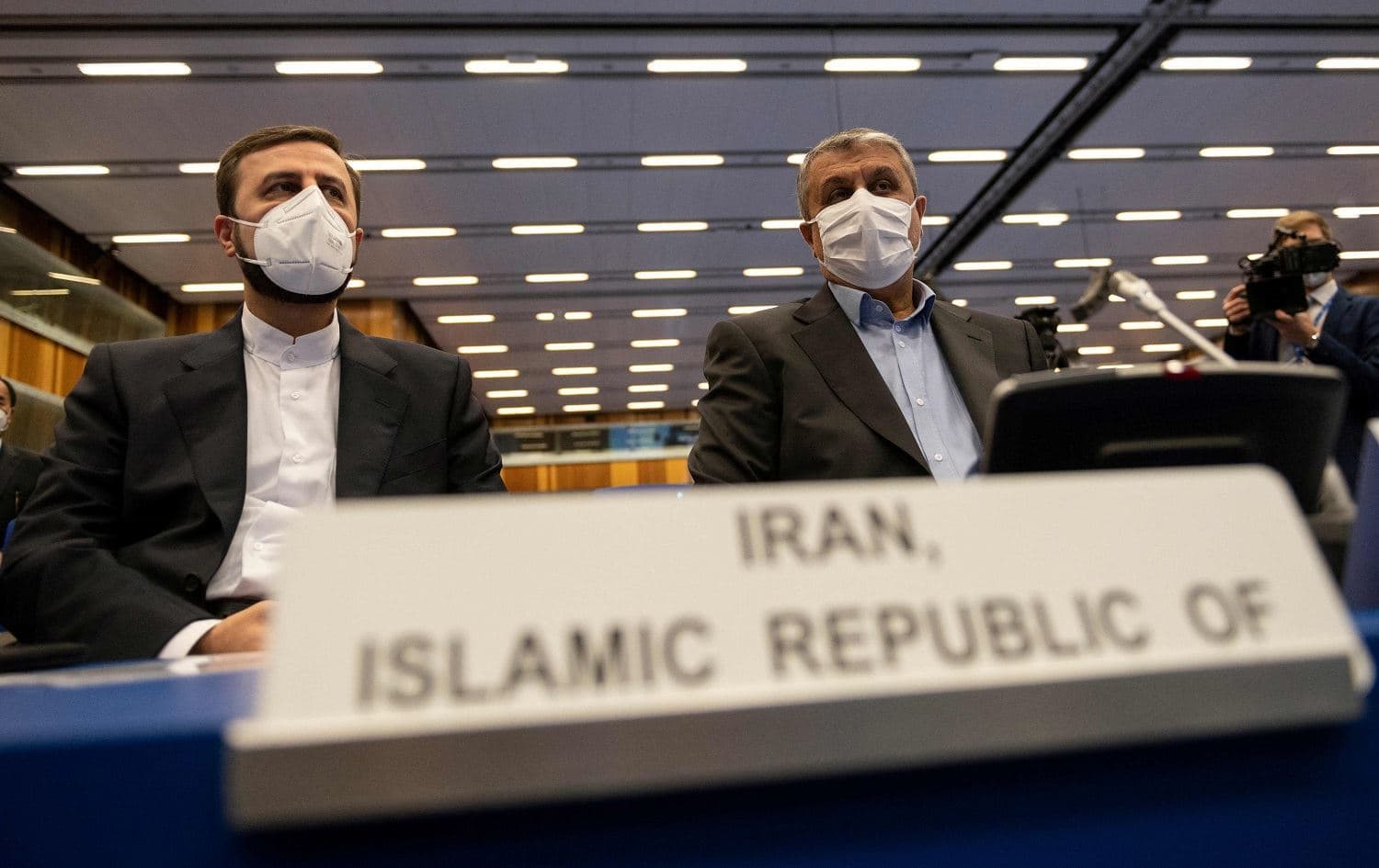 The chief of the Atomic Energy Organization of Iran Mohammad Eslami (R) and Iran's Governor to the International Atomic Energy Agency (IAEA) Kazem Gharib Abadi attend the IAEA General Conference in Vienna on September 20, 2021. Photo: Joe Klamar/AFP