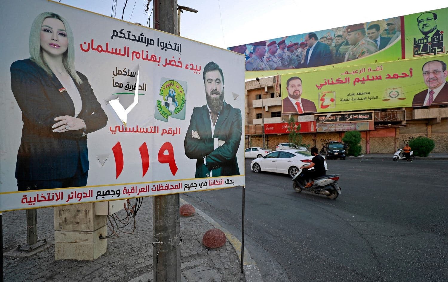 Campaign posters are seen in the Iraqi capital Baghdad on September 14, 2021. Photo: Ahmad al-Rubaye/AFP