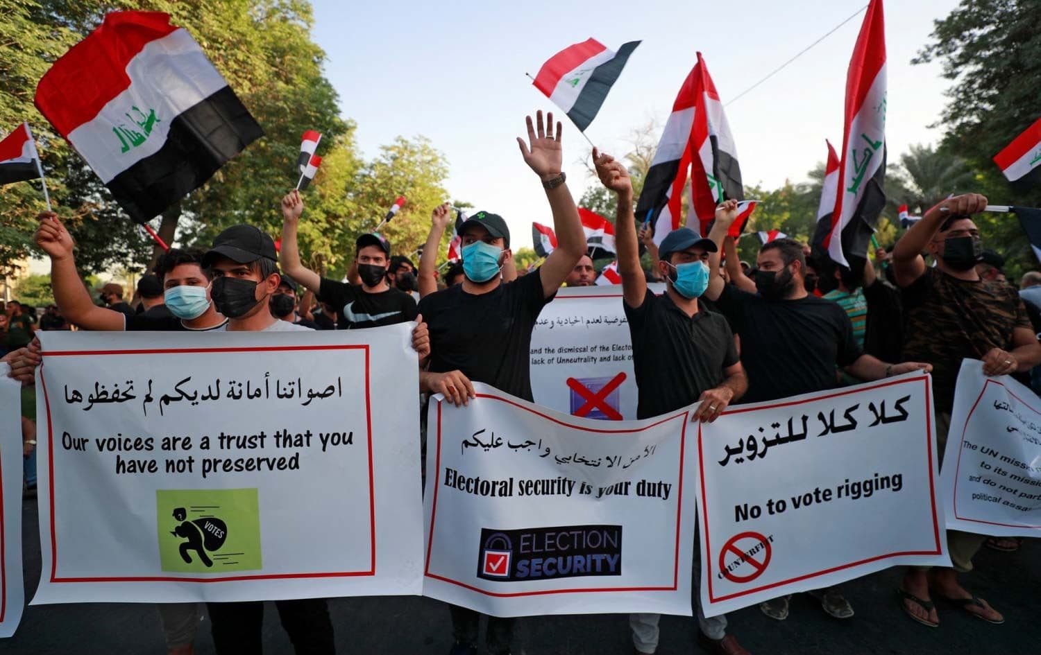 Iran-backed militia supporters protest against Iraq’s parliamentary election results in Baghdad on Tuesday. Photo: AFP