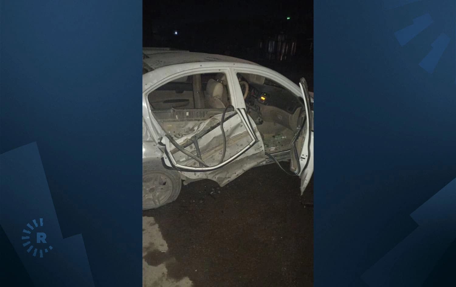 A damaged car is seen after a bombing in Manbij, northern Syria on November 27, 2021. Photo: handout/Manbij Military Council