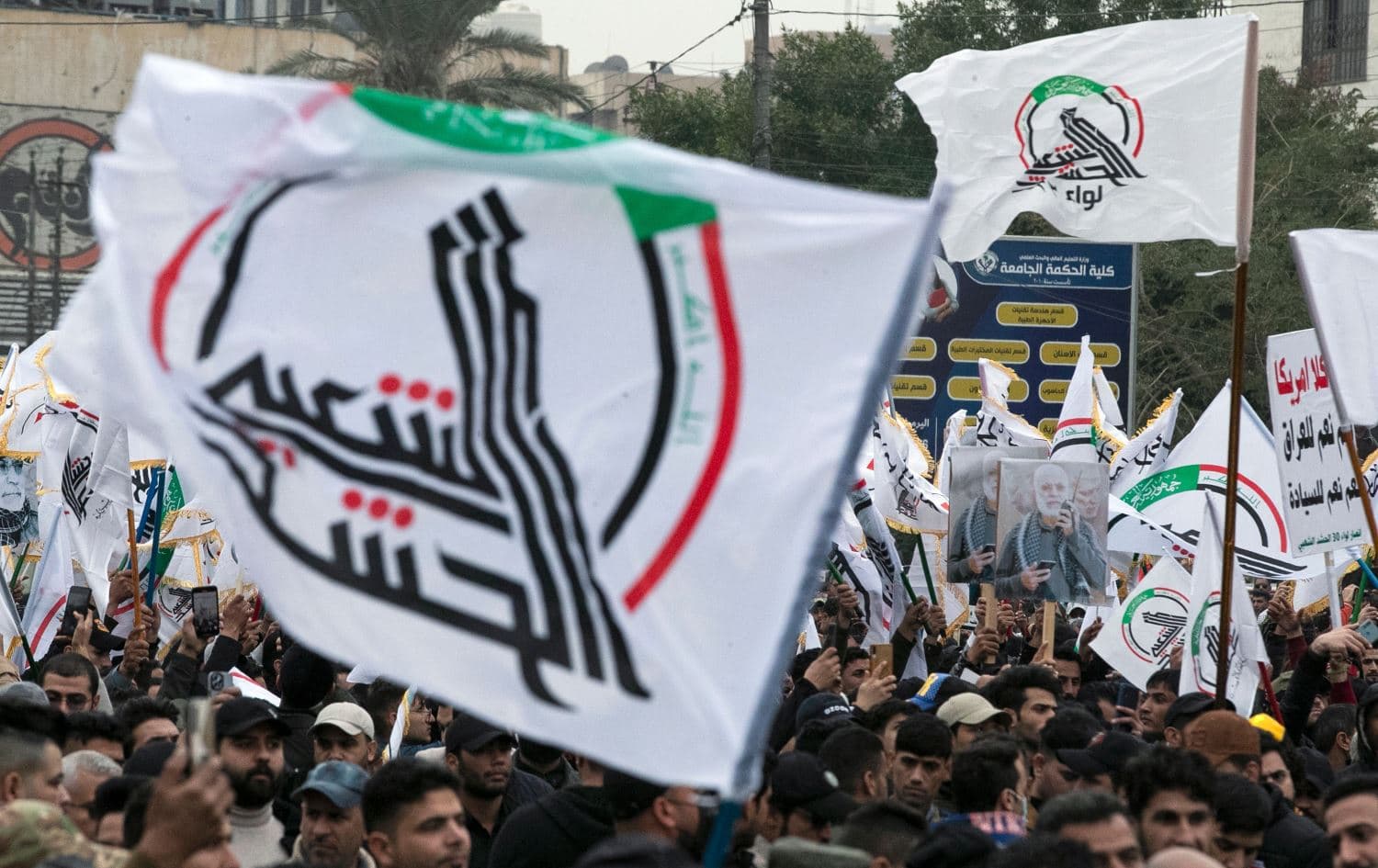 Thousands of Popular Mobilization Forces (PMF) supporters marked the killing of Iranian General Qasem Soleimani, who was assasinated by the US in 2020 in Baghdad on January 1, 2022. Photo: Sabah Arar/AFP 