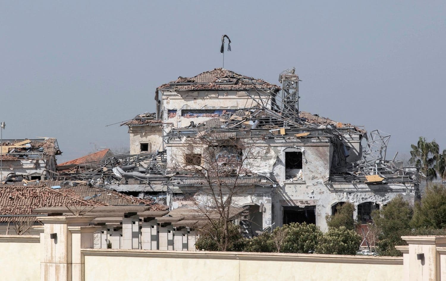 A damaged building following a missile attack in Erbil on March 13, 2022. Photo: Safin Hamed/AFP