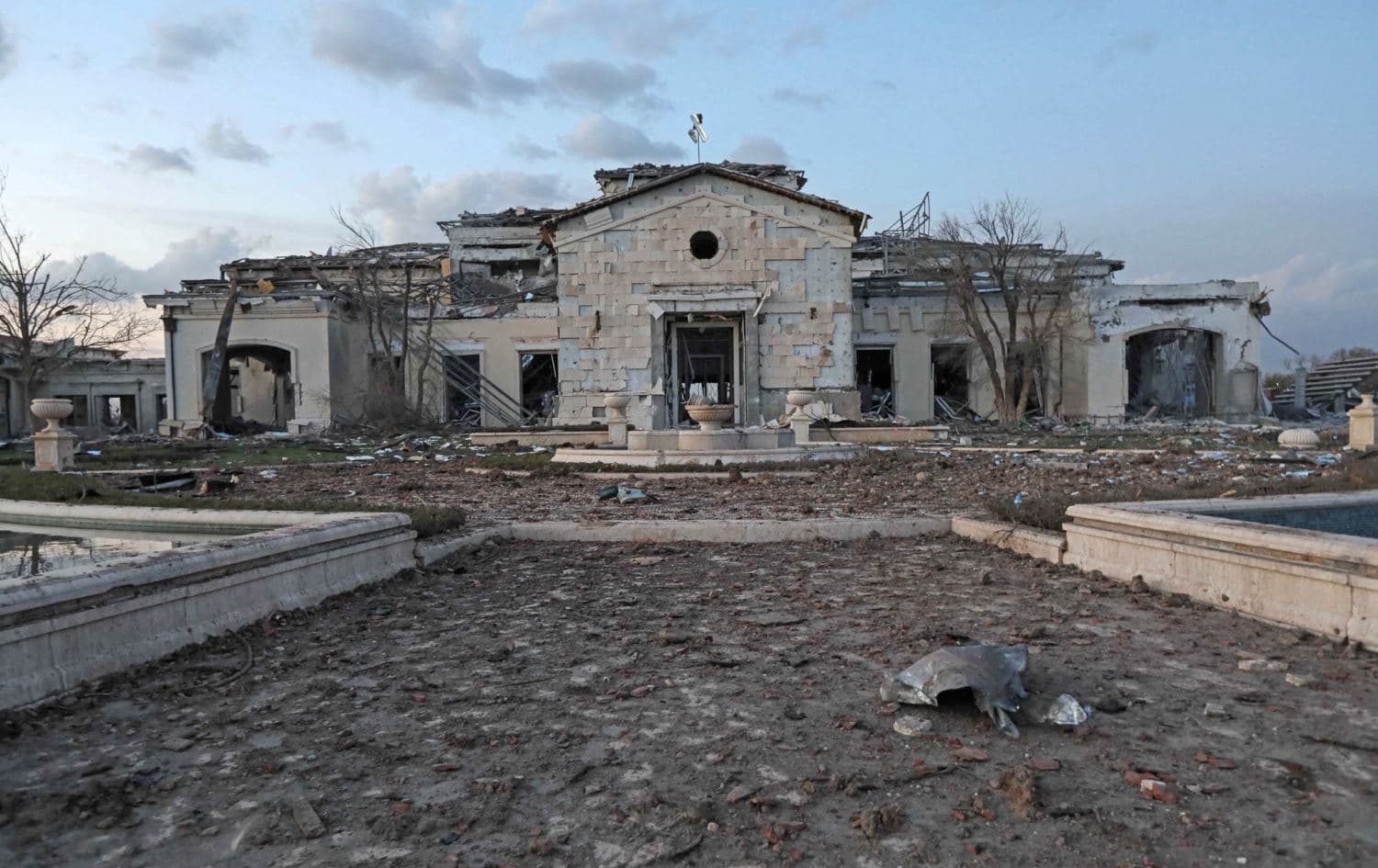 A general view shows a damaged mansion, reportedly belonging to the CEO and founder of the Iraqi-Kurdish oil company KAR Group, Baz Karim Barzinji, following an overnight attack in Erbil on March 13, 2022. Photo: Safin Hamed/AFP