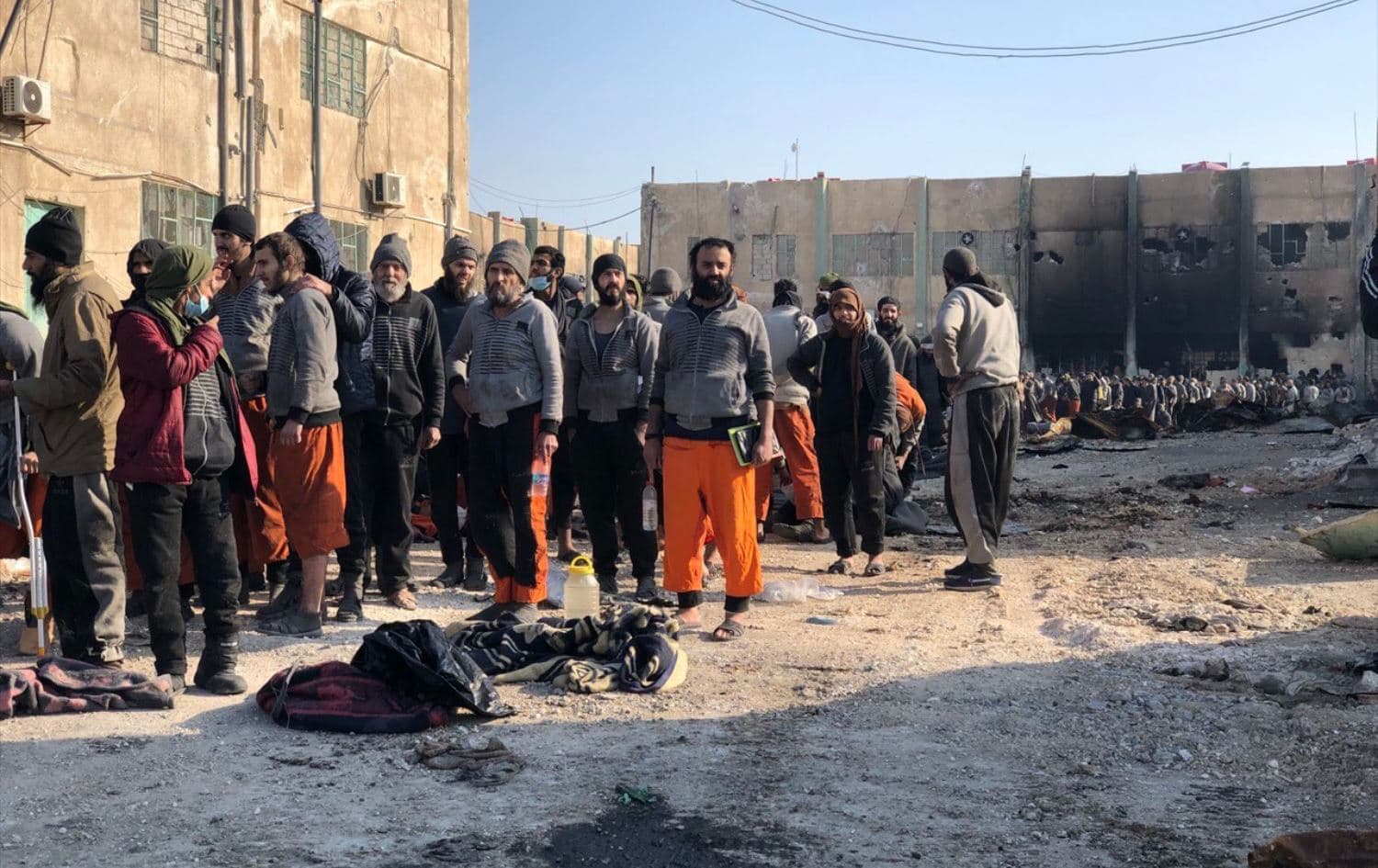 Recaptured ISIS prisoners are lined up by the SDF following a jail break by the group in Hasaka. Date: January 2022. Photo: handout 