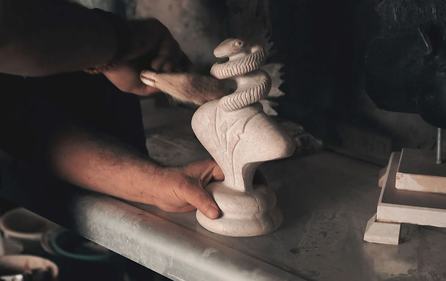 From carpentering to sculpting complex compositions with stones