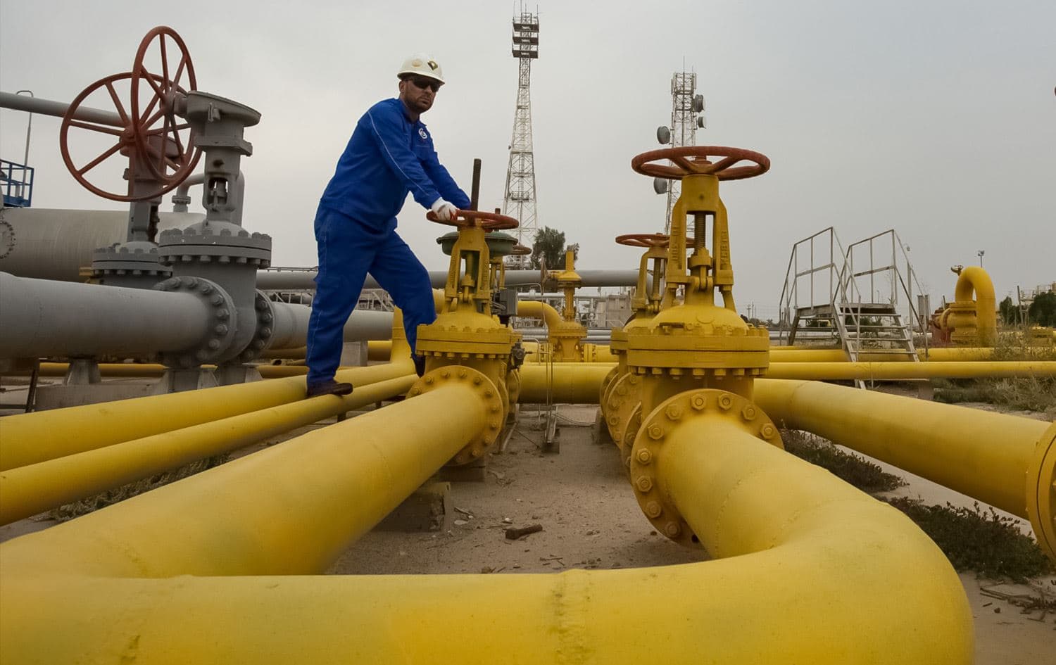 Iraqi gas workers in Basra. File photo: AFP