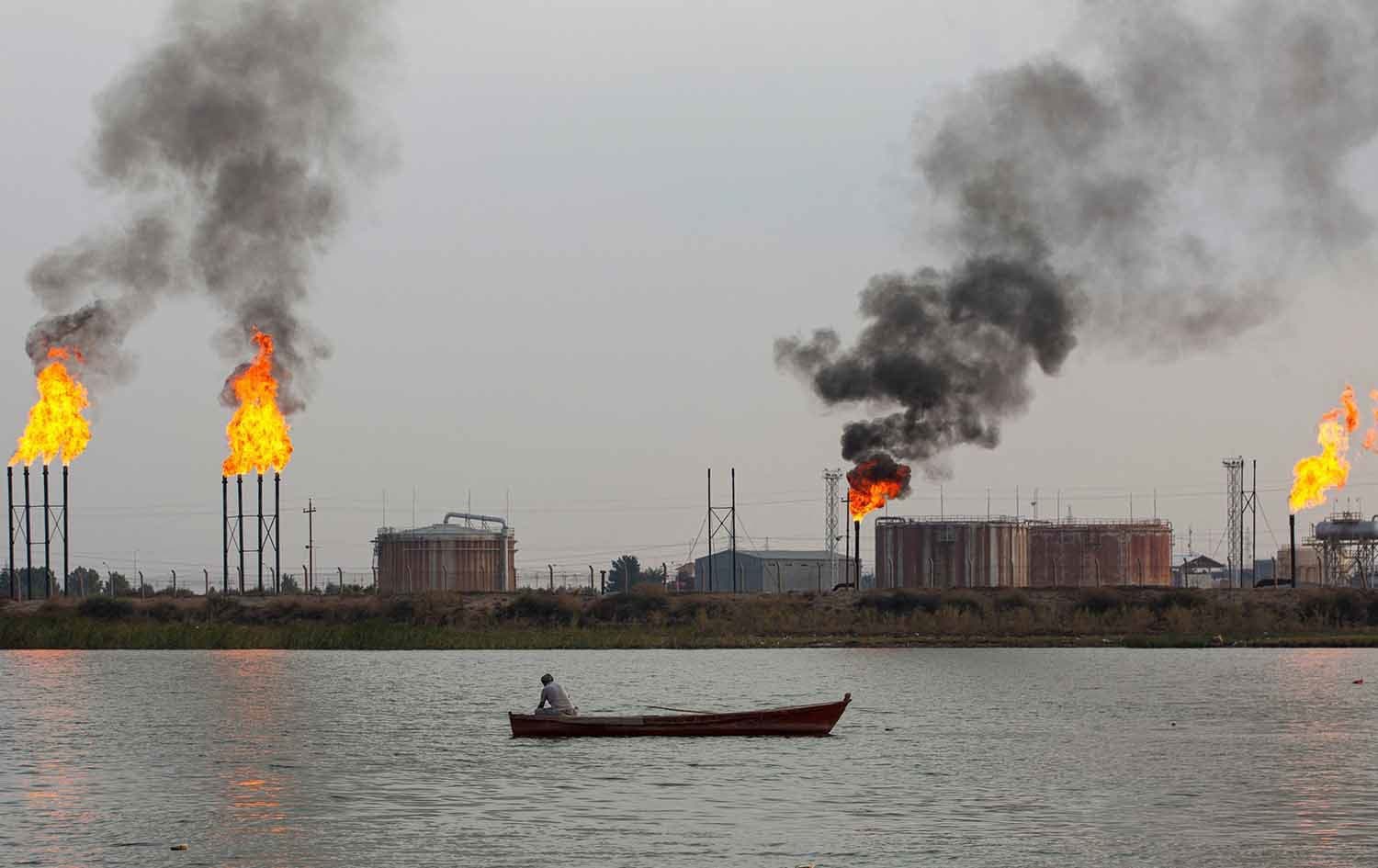 A boat sails past the Umm Qasr port near Iraq's southern port city of Basra on February 11, 2022. Photo: AFP