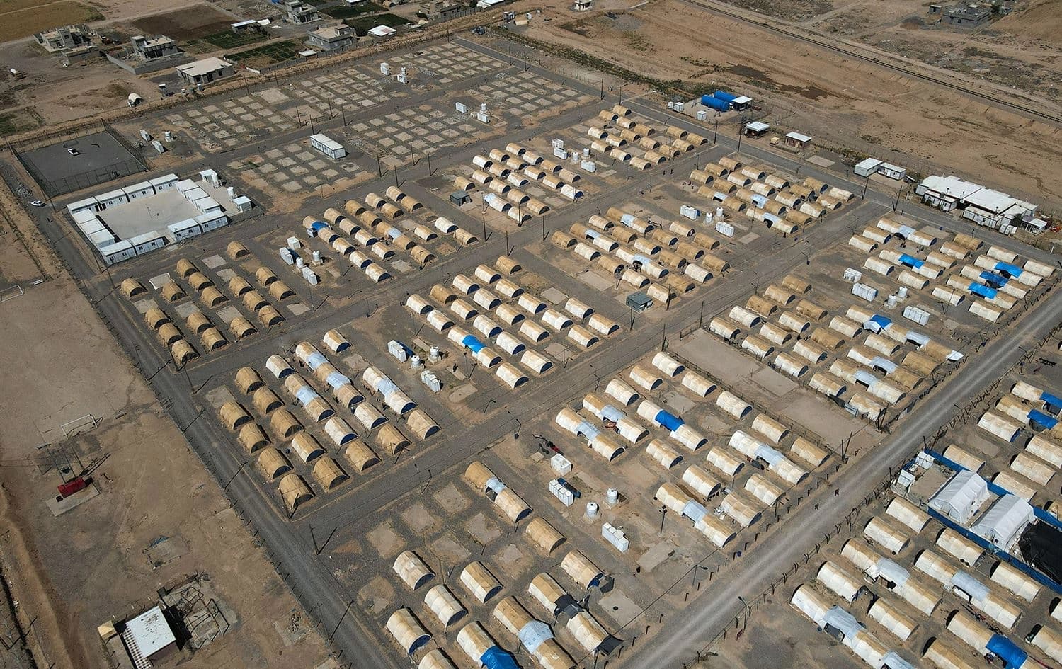 An aerial picture shows a view of the Jadaa rehabilitation camp for the displaced near the northern Iraqi city of Mosul, on May 11, 2022. Photo: Zaid al-Obeidi/AFP