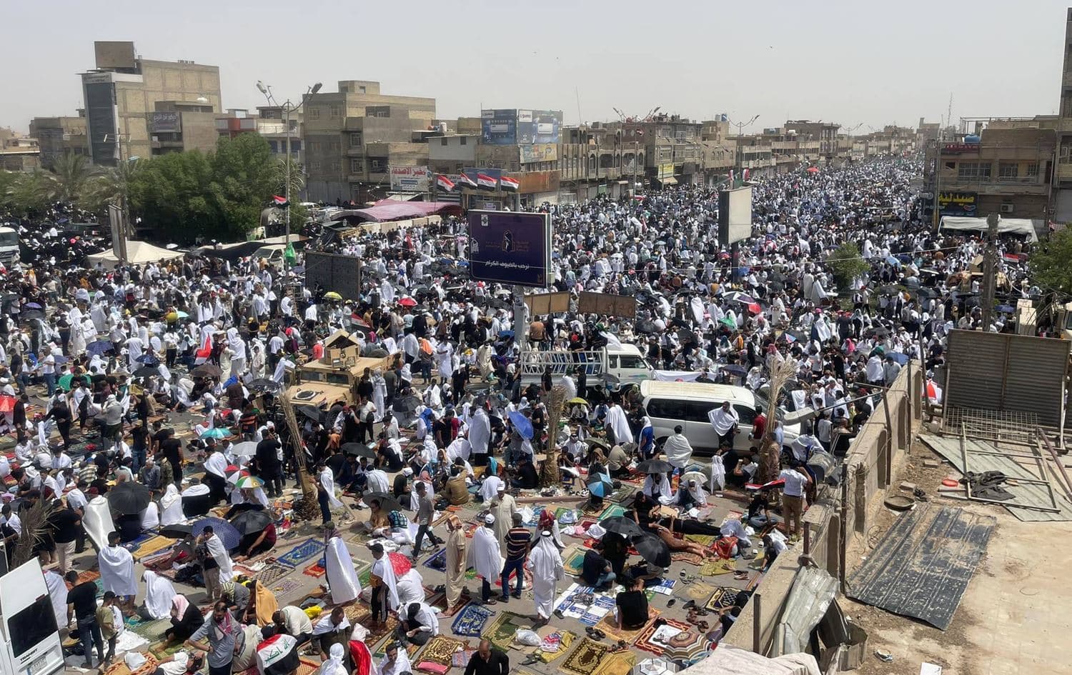 Masses of Muqtada al-Sadr supporters rally for Friday prayer in Baghdad, Iraq on July 15, 2022. Photo: Halkawt Aziz/Rudaw