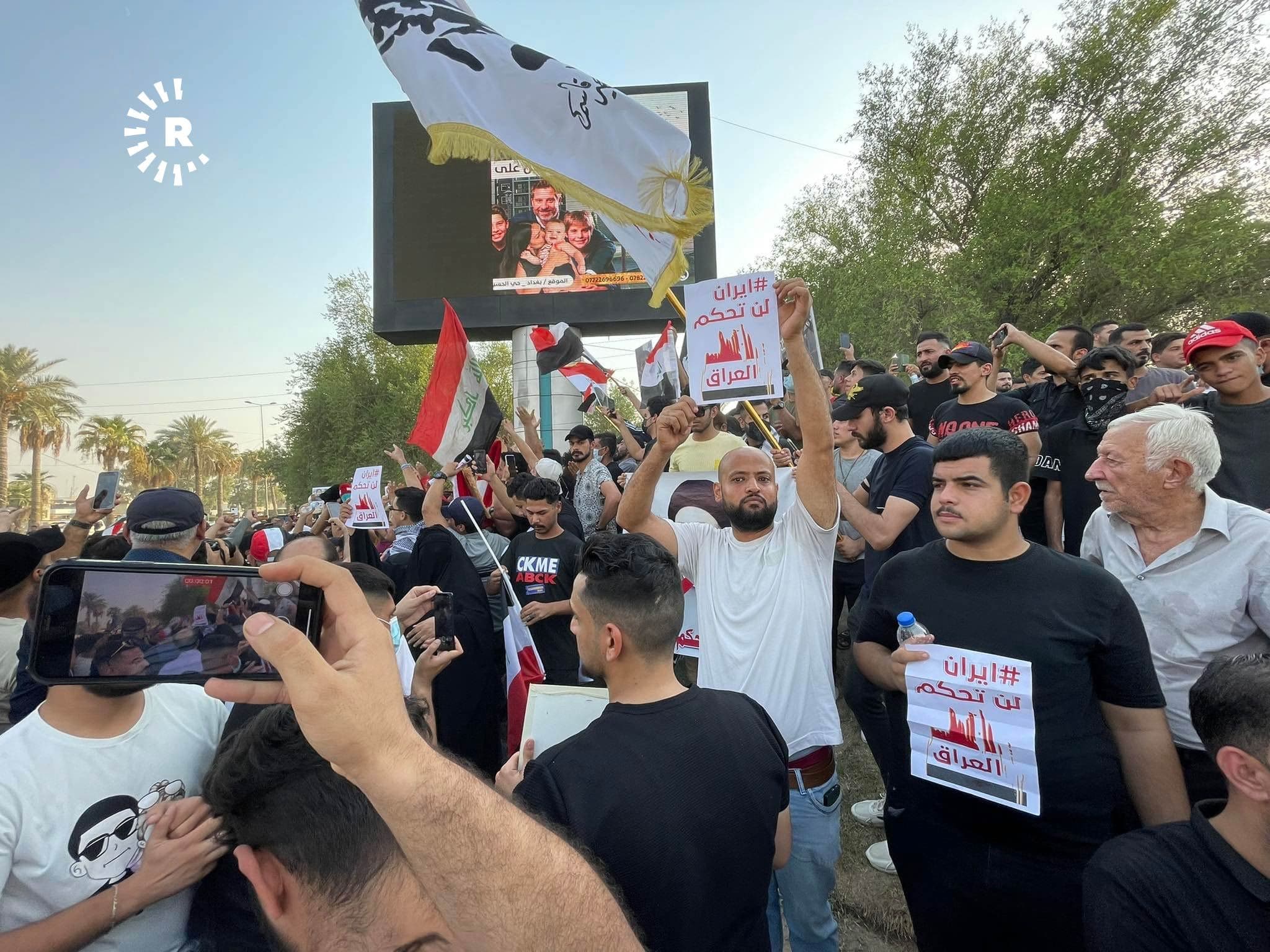 “Iran does not rule Iraq,” reads a paper held by many protesters in Baghdad on September 2, 2022. Photo: Rudaw