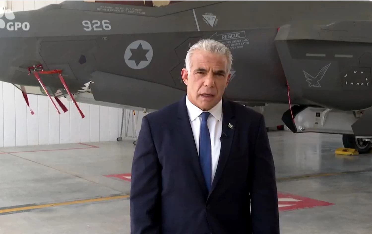 In this screengrab from a video, Israeli Prime Minister Yair Lapid warns Iran while standing next to a F-35 stealth bomber. Photo: Prime Minister of Israel/Twitter