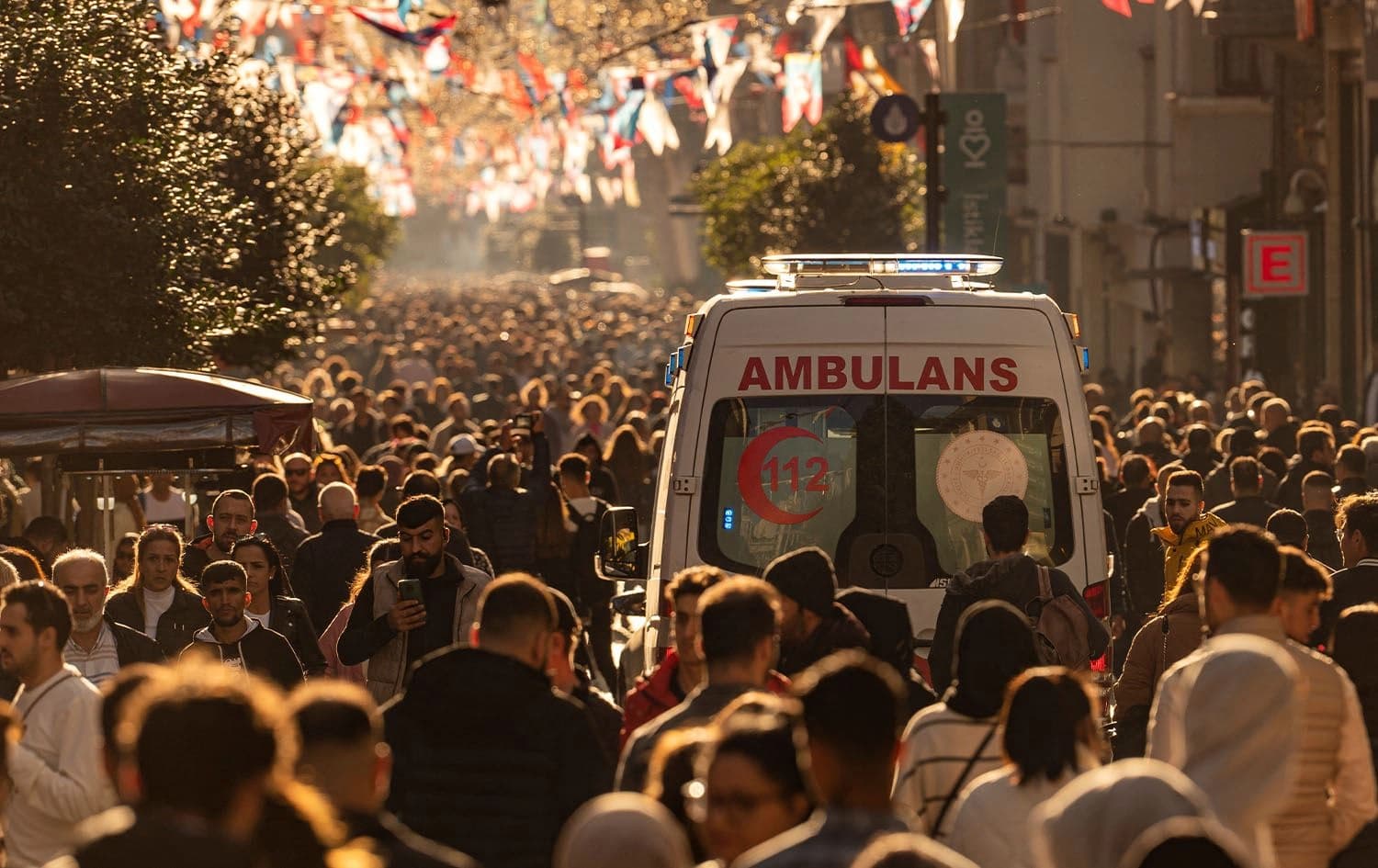 This photograph taken on October 21, 2022, shows an ambulance vehicle driving down the crowded Istiklal street in Istanbul. Photo: Yasin Akgul/AFP
