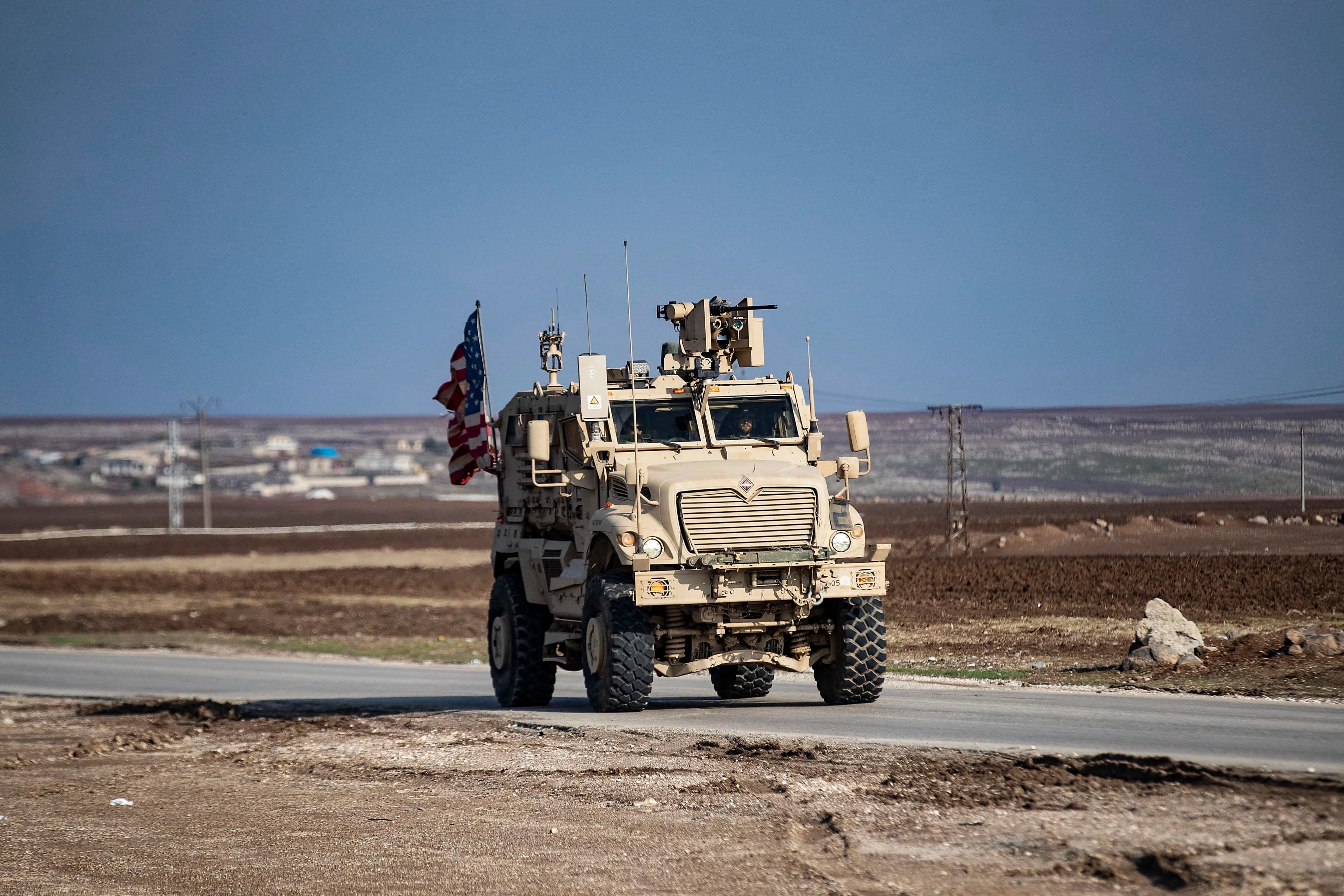 US forces patrol near the countryside of Rumaylan (Rmeilan) in Syria's northeastern Hasakeh province near the Turkish border, on December 2, 2022. Photo: Delil Souleiman/AFP