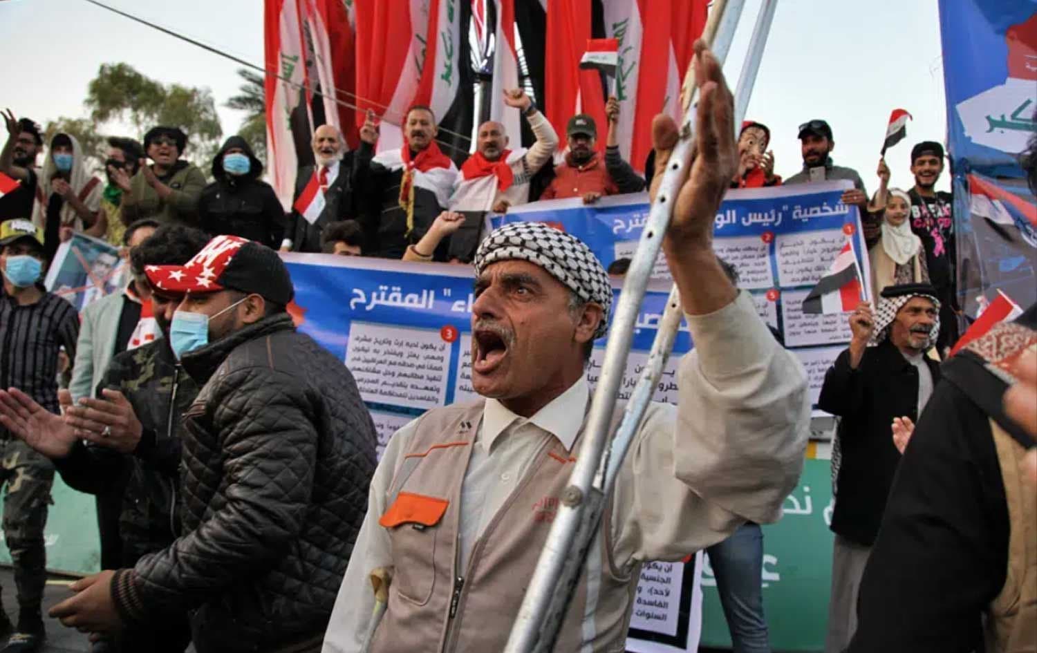 Protesters chant slogans against Iran in Tahrir Square during anti-government demonstrations in Baghdad, Iraq, Dec. 26, 2019. Photo: AP 