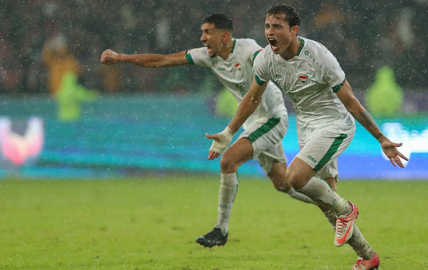 Iraq's midfielder Ibrahim Bayesh (R) celebrates scoring during the Arabian Gulf Cup football match between Iraq and Saudi Arabia at the Basra International Stadium in Iraq's eponymous southern city on January 9, 2023. Photo: Hussein Faleh/AFP