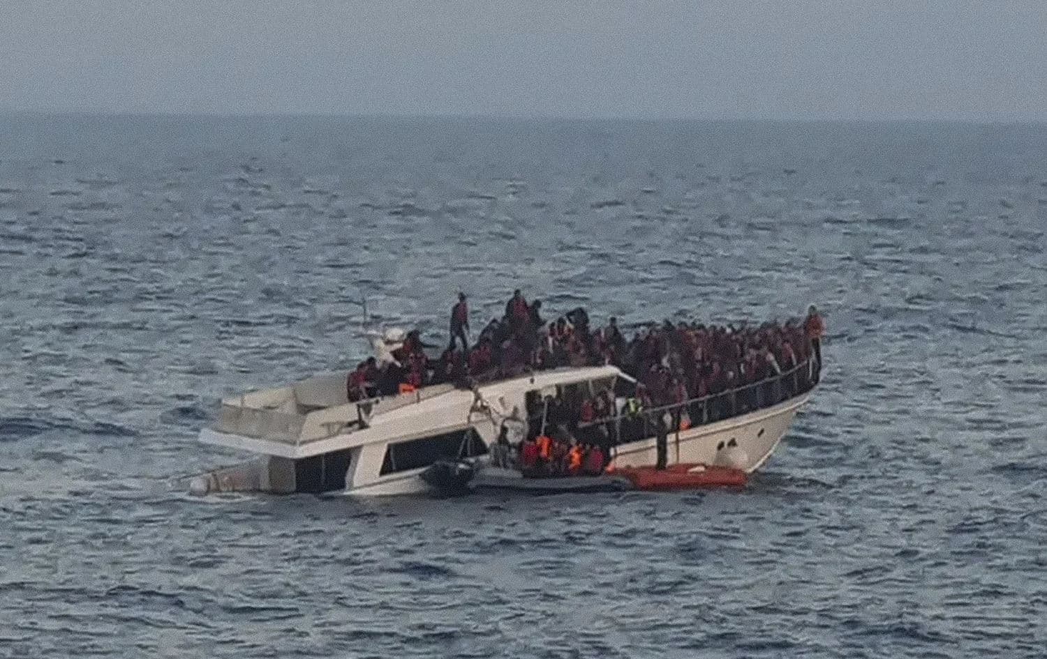 Saved from death at sea, Syrian refugees face deportation