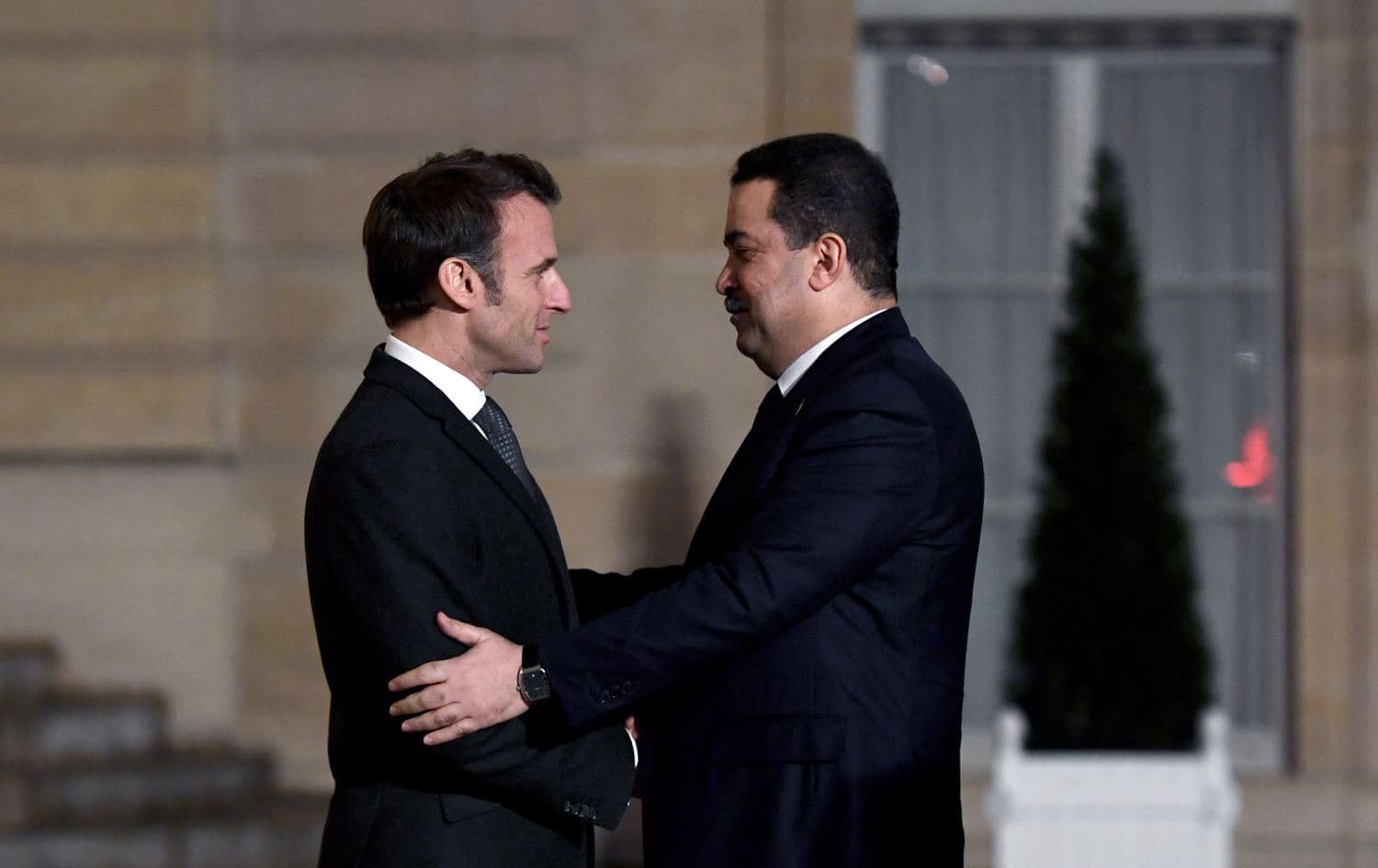 French President Emmanuel Macron welcomes Iraq's Prime Minister Mohammed Shia' al-Sudani at the Elysee Presidential Palace, in Paris, on January 26, 2023. Photo: Christophe Archambault/AFP