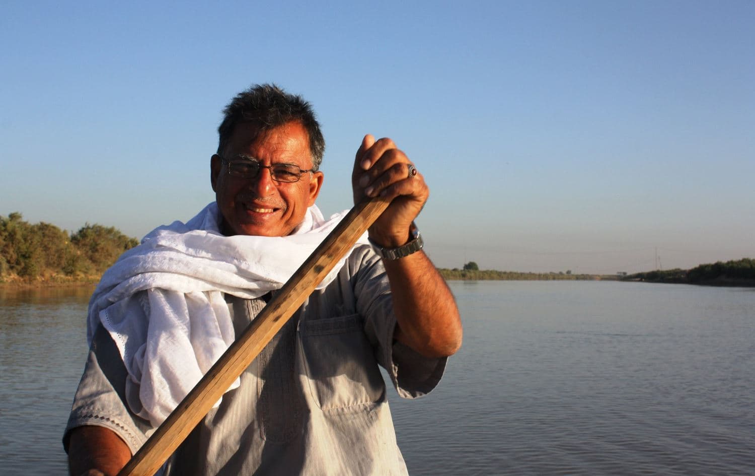 Environmental activist Jassim al-Assadi rowing in the marshes of Iraq. Photo: Jassim al-Assadi/Facebook