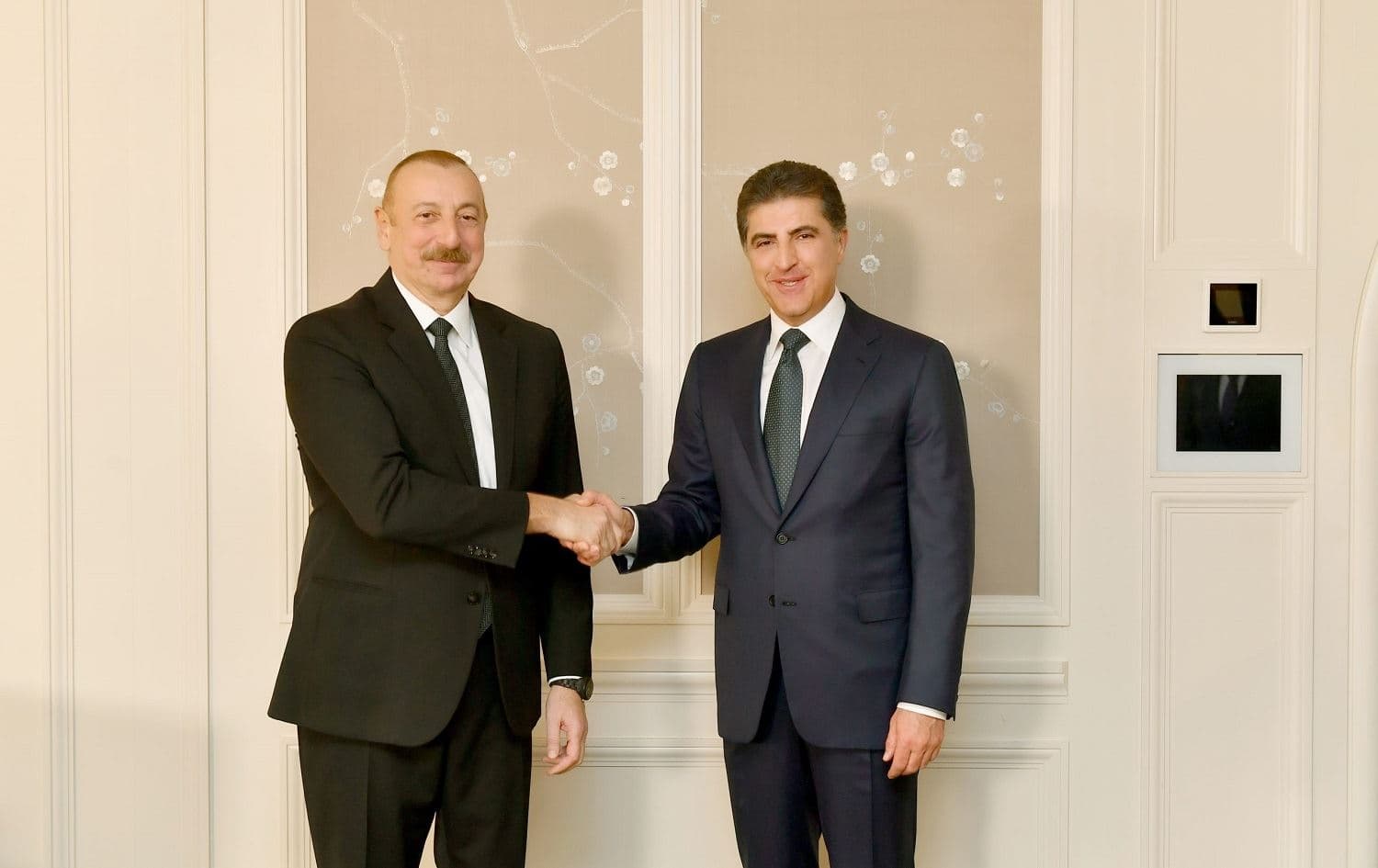 Azerbaijan President Ilham Aliyev (left) shakes hands with Kurdistan Region President Nechirvan Barzani in Munich, Germany on February 18, 2023. Photo: handout/Kurdistan Region Presidency