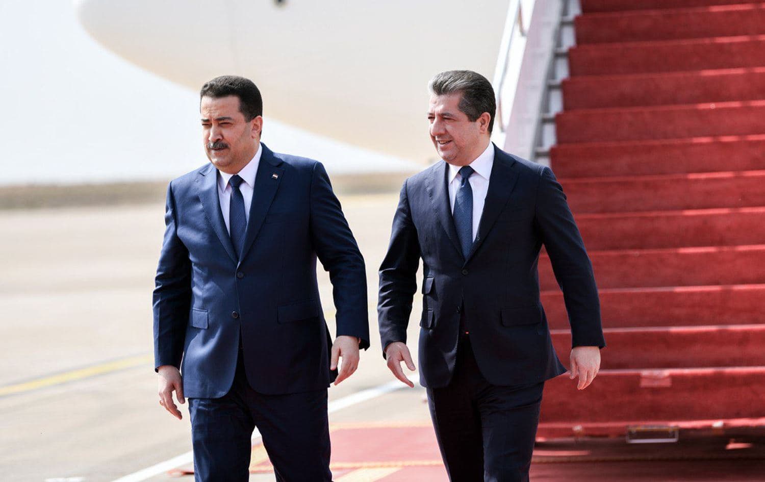 Iraqi Prime Minister Mohammed Shia' al-Sudani (left) being greeted by Kurdistan Region Prime Minister Masrour Barzani (right) upon arriving in Erbil on March 14, 2023. Photo: KRG