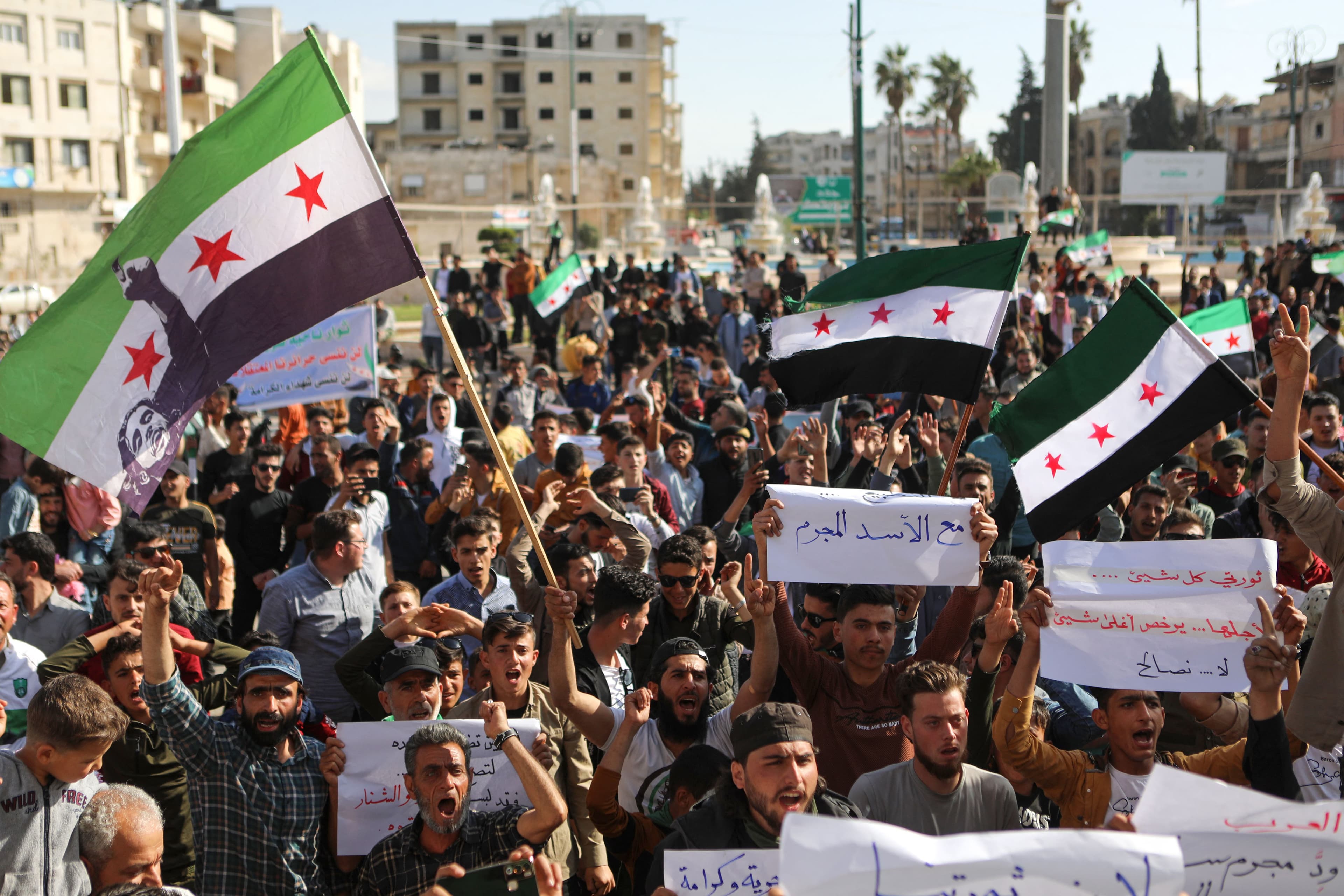 Syrians protest Arab detente with Assad