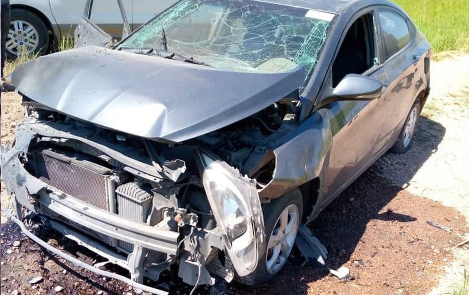 Aftermath of the destroyed car targeted by the suspected Turkish drone strike on Kobani, northern Syria on April 25, 2023. Photo: ANHA