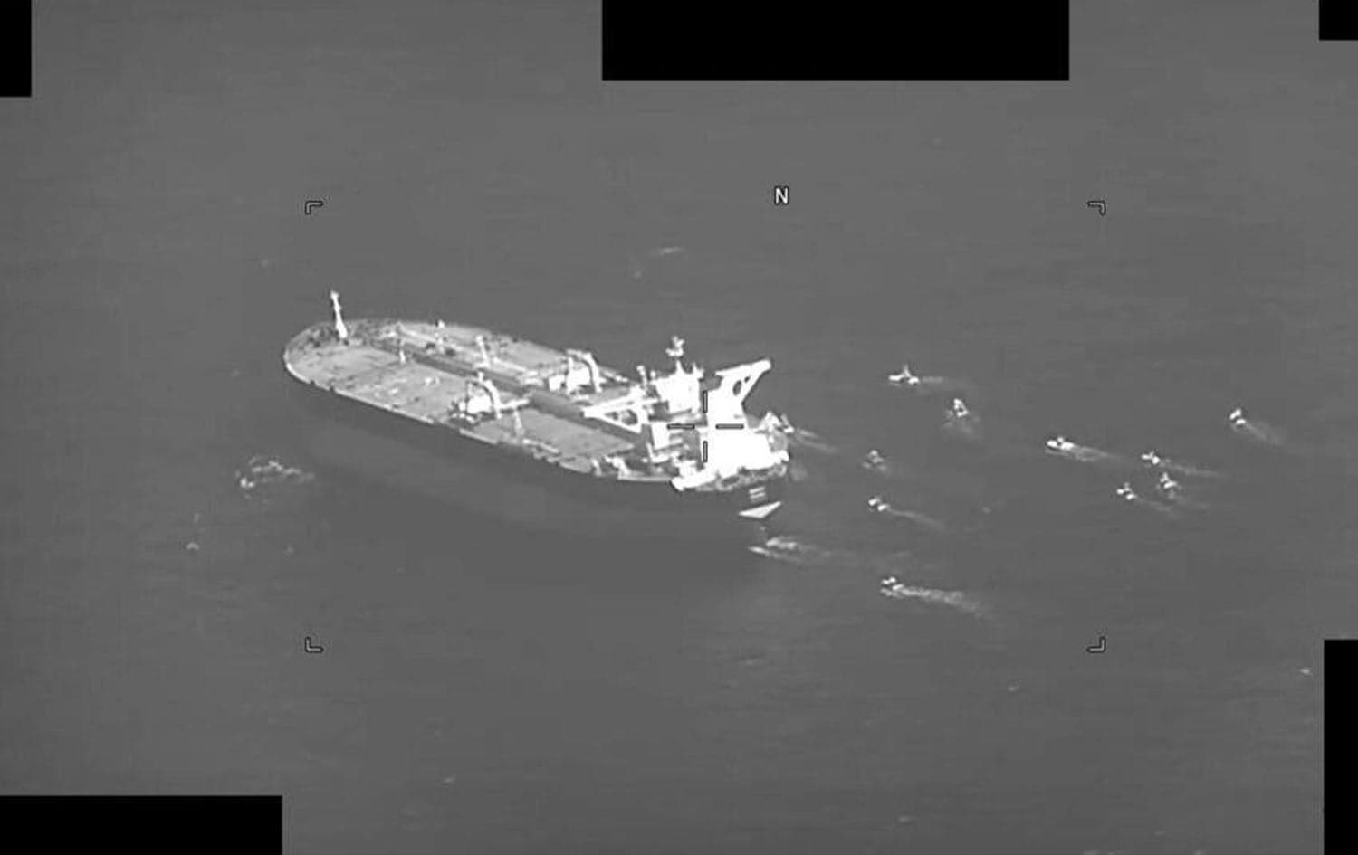 This US Navy handout screenshot of a video shows fast-attack craft from Iran's Islamic Revolutionary Guard Corps Navy swarming Greek-owned oil tanker Niovi as it transits the Strait of Hormuz. Photo: US Navy/AFP