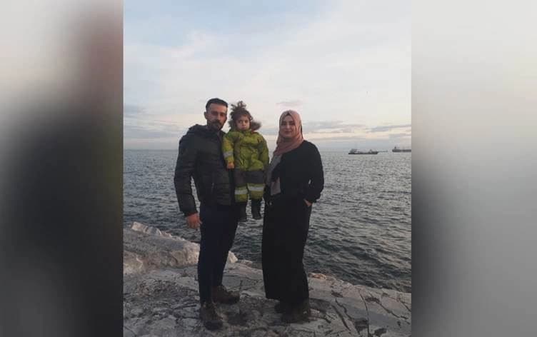 Mina (middle) and her parents pose for a photo in an unidentified place. Photo: submitted 