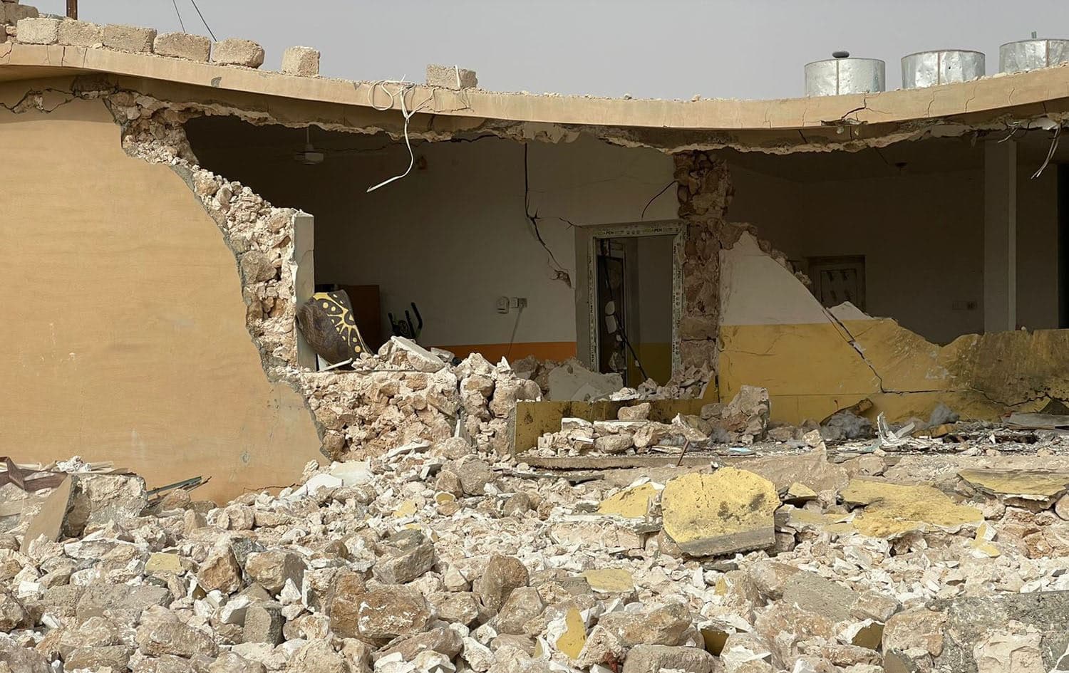 The aftermath of a suspected Turkish drone strike on a house allegedly belonging to the YBS in Shingal on May 23, 2023. Photo: Rojnews
