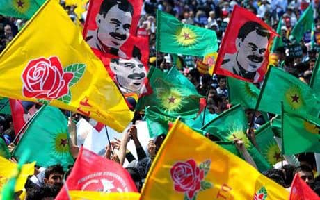Kurds wave flags for the PKK  at a rally. AFP,Getty Images