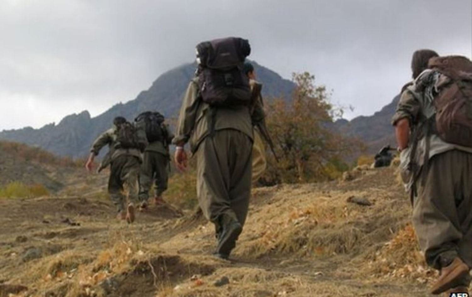 PKK fighters crossing mountain on foot. File photo: AFP