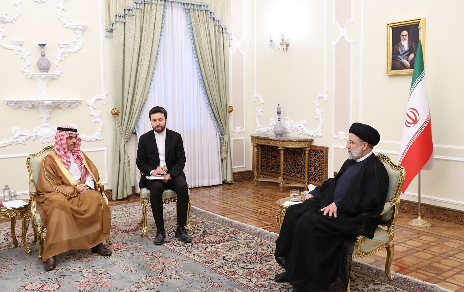 This handout picture provided by the Iranian presidency shows Iran's President Ebrahim Raisi (R) meeting with Saudi Foreign Minister Faisal bin Farhan in Tehran during a visit on June 17, 2023. Photo: Iranian presidency/AFP