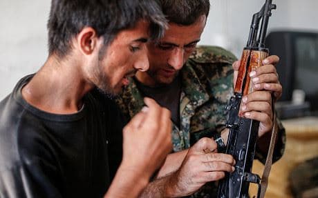 Many Yezidi men trained with the Peshmerga and the Syrian People’s Protection Units (YPG) to defend Shingal. 