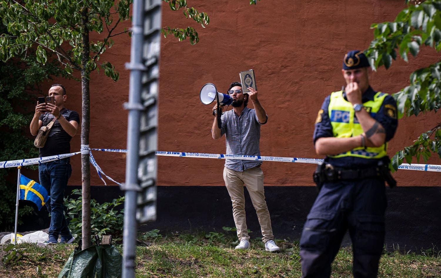 Salwan Momika protests outside a mosque in Stockholm on June 28, 2023, during the Eid al-Adha holiday. Photo: Jonathan Nackstrand/AFP
