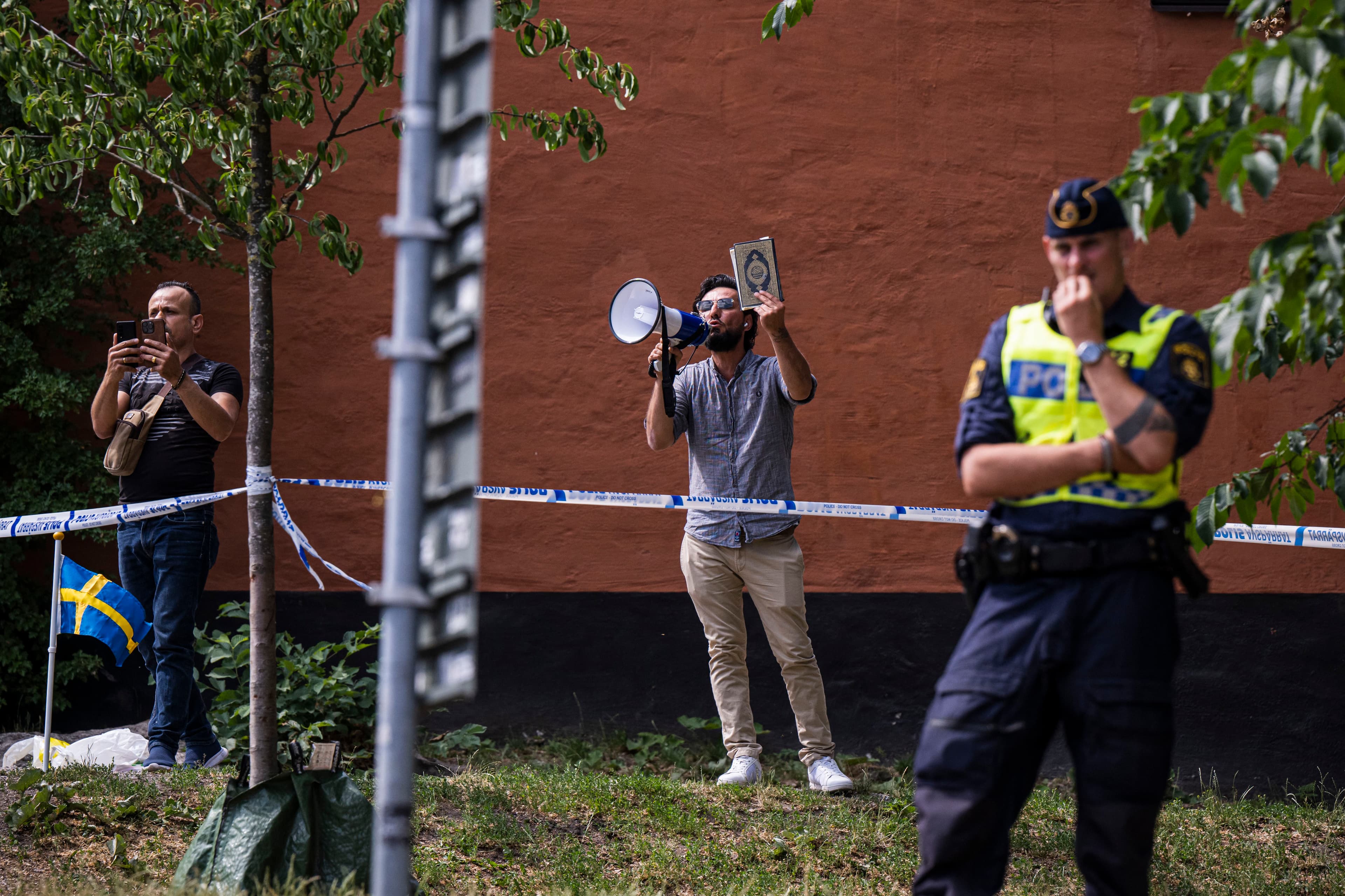 Salwan Momika protests outside a mosque in Stockholm on June 28, 2023. Photo: AFP 