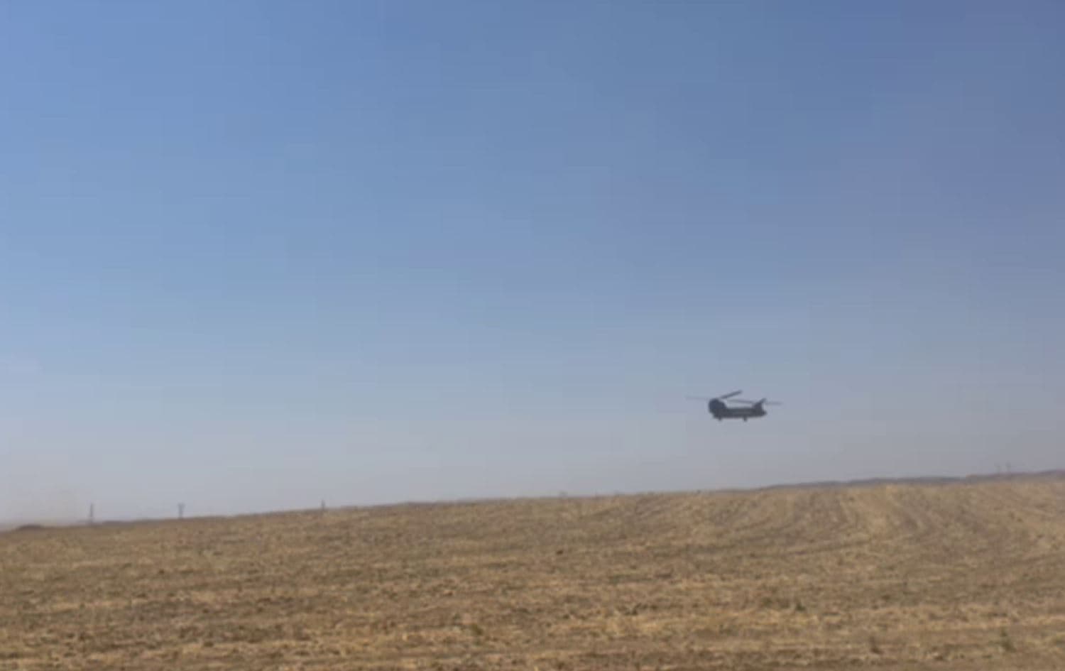 A US-led coalition helicopter seen near Erbil province's Gwer district after a helicopter crashed in the area on July 27, 2023. Photo: Rudaw