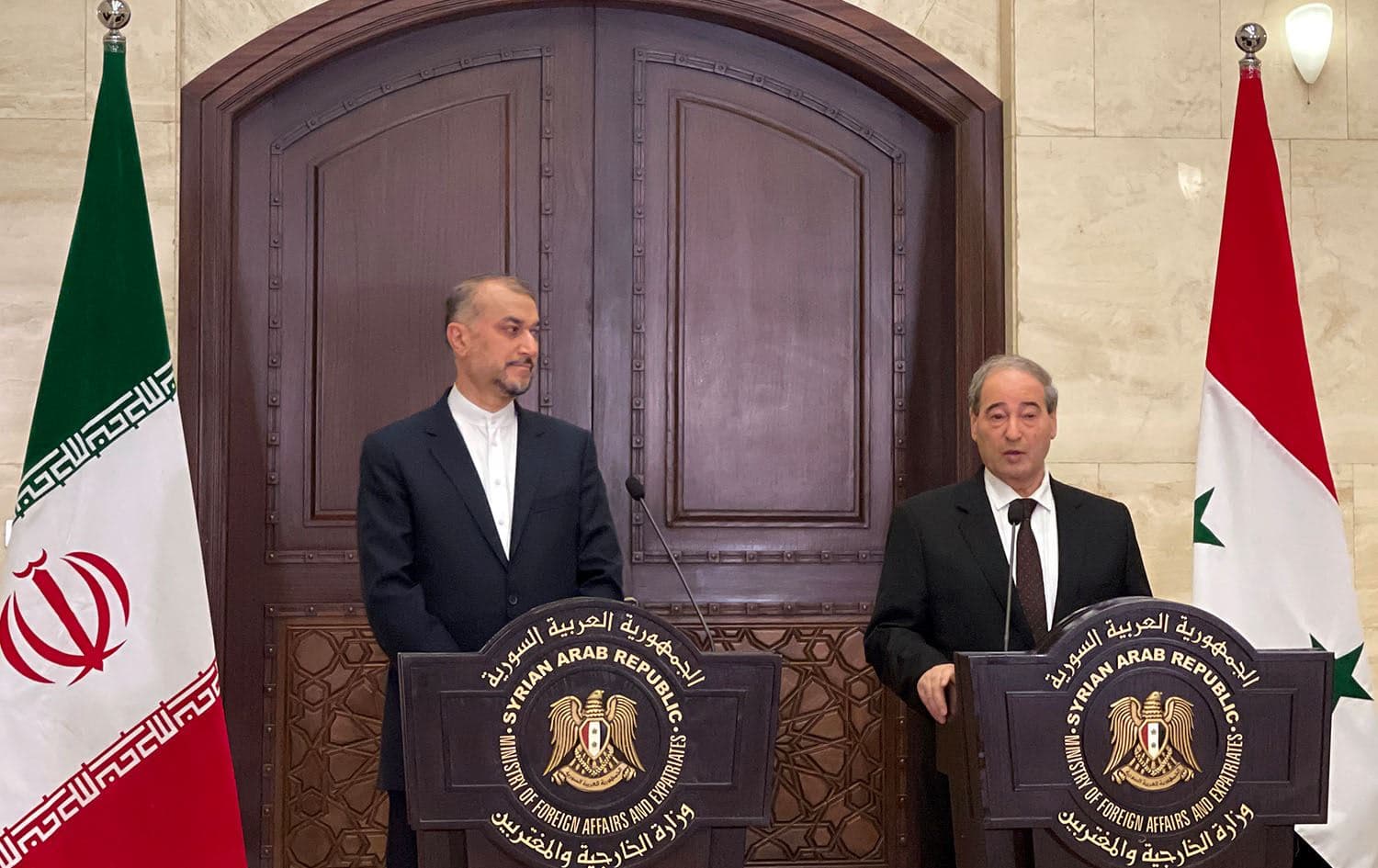 Syrian Foreign Minister Faisal Mekdad (R) speaks during a press conference with his Iranian counterpart Hossein Amir-Abdollahian in the capital Damascus, on August 30, 2023. Photo: Maher Al Mounes/AFP