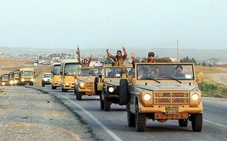 Peshmerga forces on their way to Kobane. Photo: DHA.