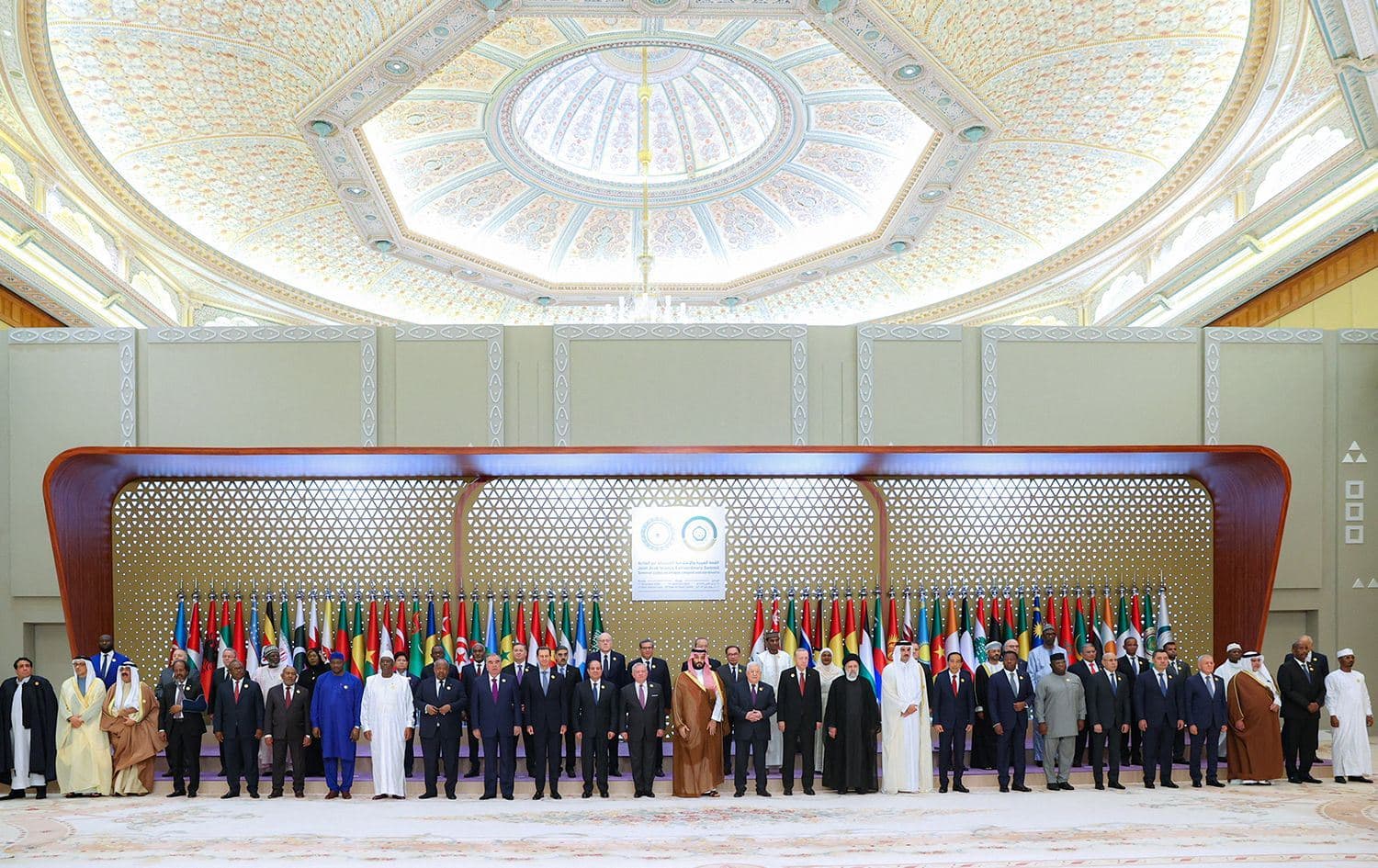 Middle East leaders pose for a group portrait before an emergency meeting of the Arab League and the Organisation of Islamic Cooperation in Riyadh on November 11, 2023. Photo: Iranian Presidency/AFP