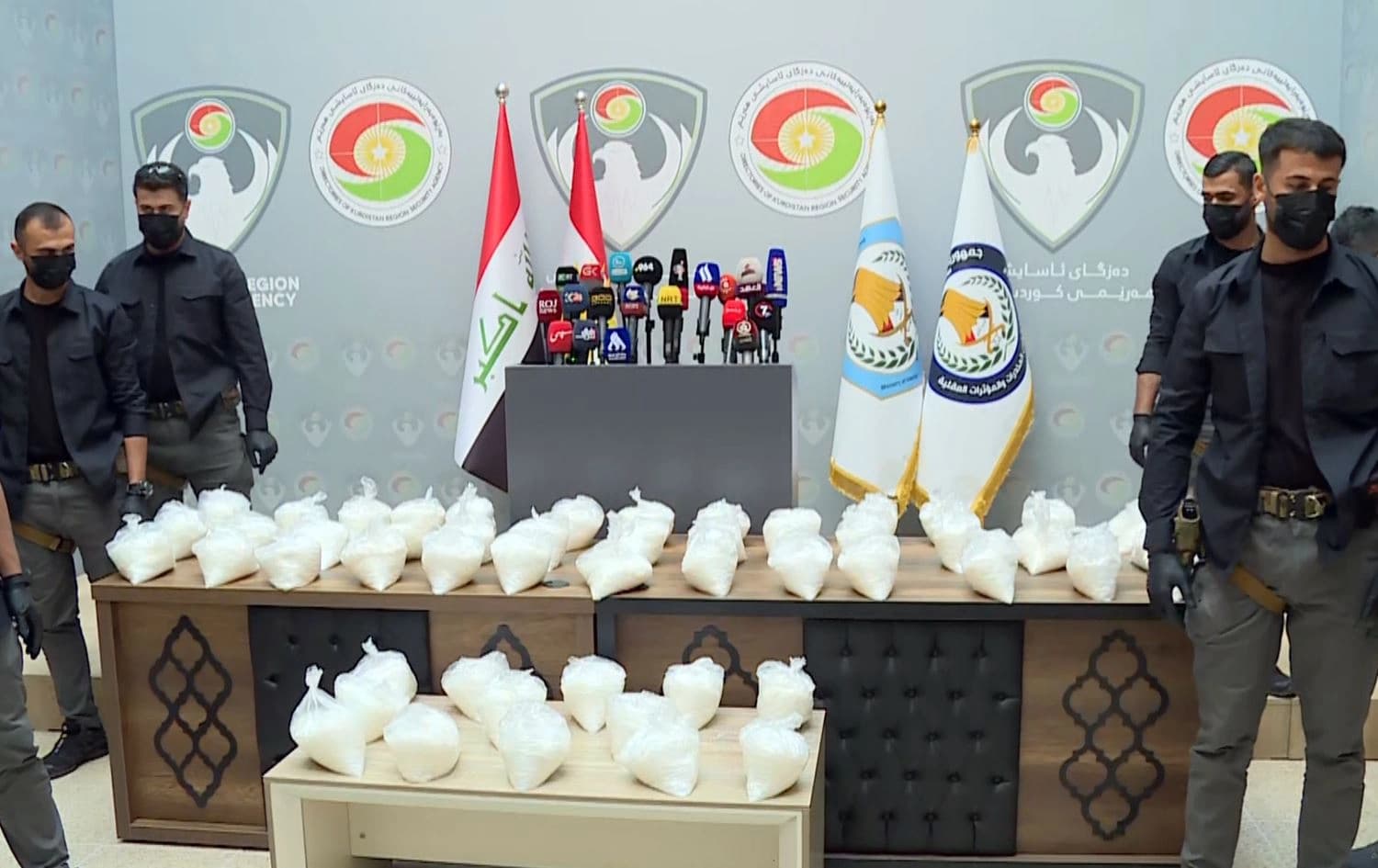 Iraqi and Kurdish anti-narcotic forces display confiscated narcotics during a joint presser in Sulaimani on November 24, 2023. Photo: Rudaw/screengrab
