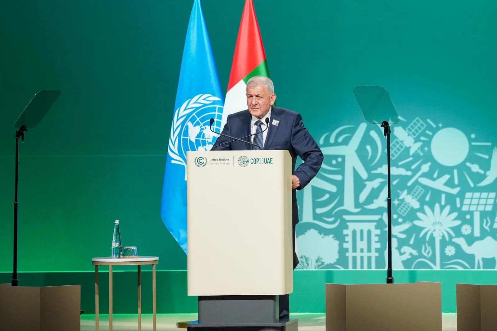 Iraq's President Abdul Latif Rashid speaking at COP28 in Dubai on December 1, 2023