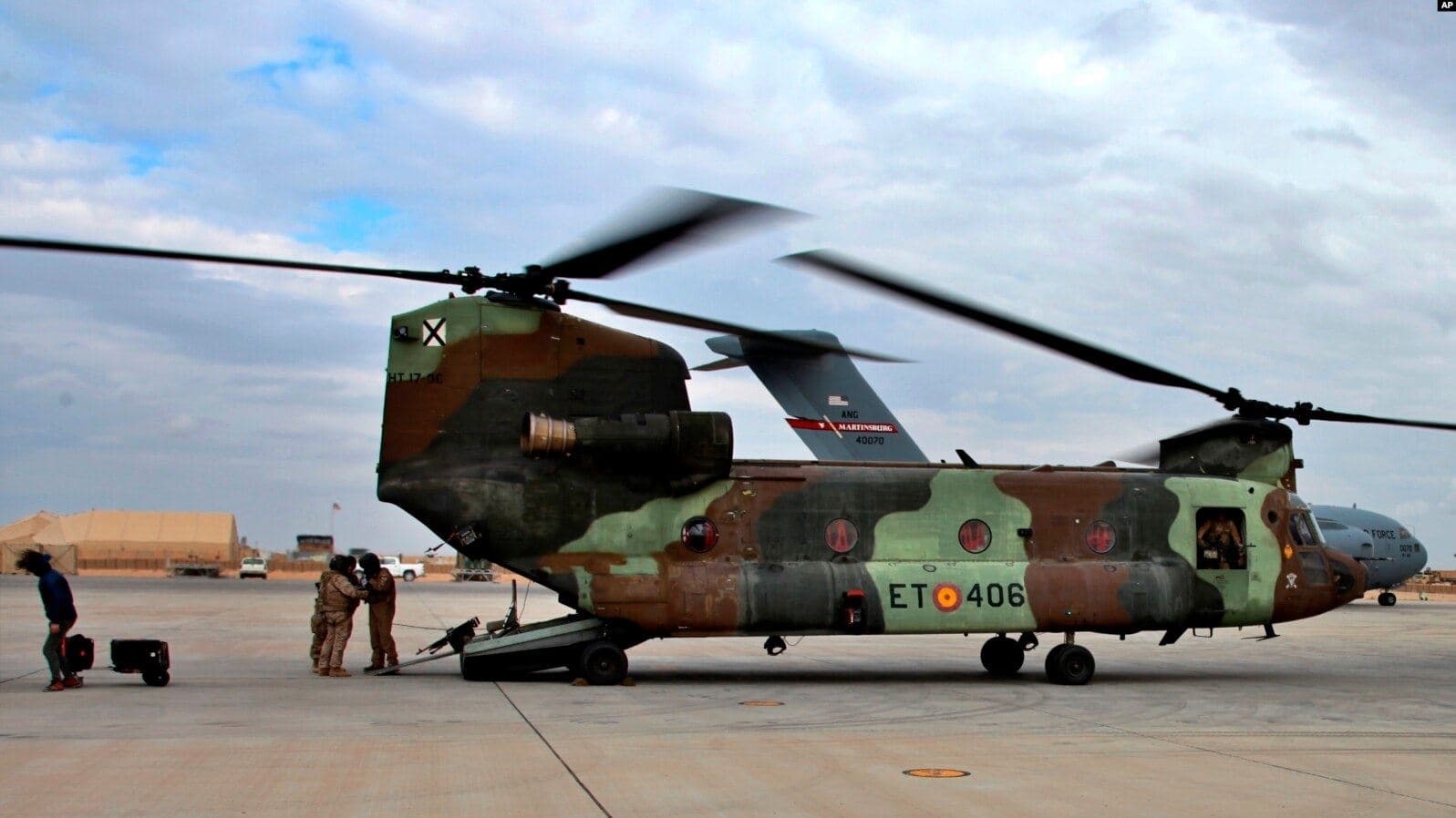 A US Air Force helicopter sits at Ain al-Asad airbase in western Iraq on January 13, 2020. Photo: AP