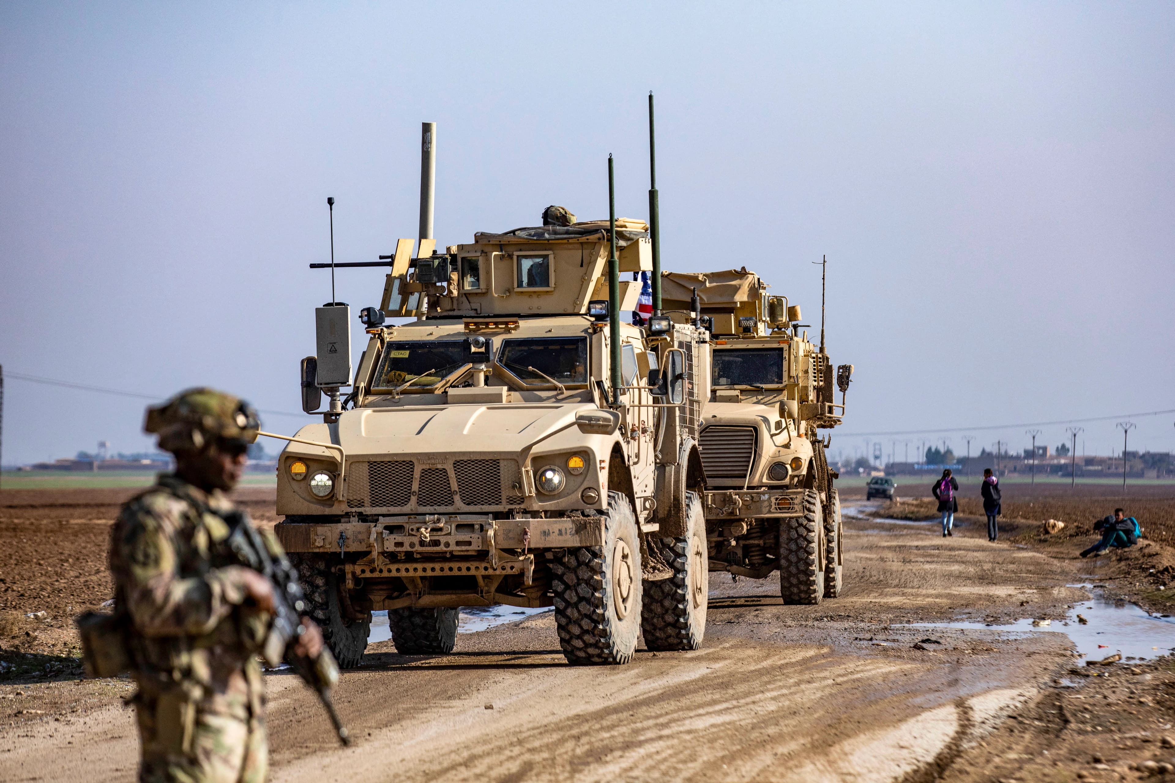 US soldiers patrol an area on the outskirts of Rumaylan in Rojava on December 11, 2023. Photo: Delil souleiman/AFP