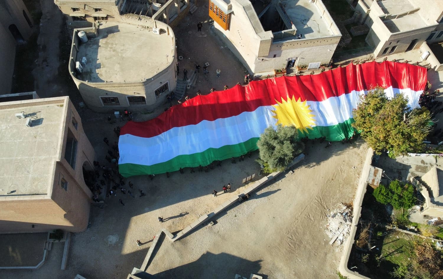 A large Kurdistan Region flag carried in Erbil's ancient citadel. Photo: Bilind T. Abdullah/Rudaw