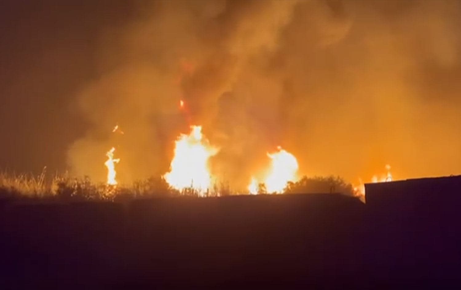 Fire rises from the Kalsu military base in Iraq's Babil province following explosions on April 20, 2024. Photo: screengrab/PMF Telegram channels 