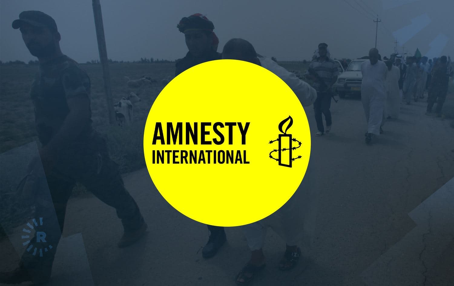 Top: Amnesty logo. Background: Iraqi pro-government militiamen escort men they detain for investigation after driving out ISIS militants of the village of Sayed Ghareeb, some 70 km north of Baghdad on June 2, 2015. Photo: Mohammed Sawaf/AFP